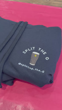 Black hoodie with split the g trend log and @splitting_the_g influencer logo on red background